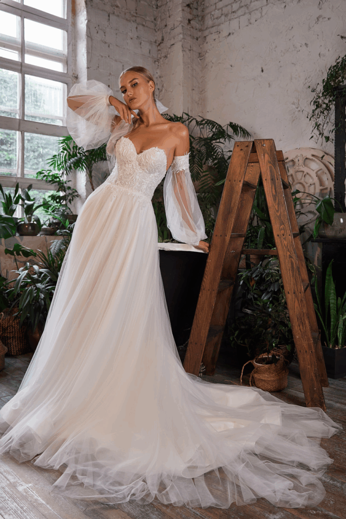 Robe de mariée sur-mesure bustier coeur manches amovible Paris France Createur